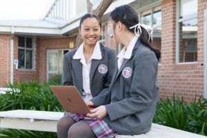 Students enjoying the spacious grounds at Mary MacKillop Catholic College Wakeley