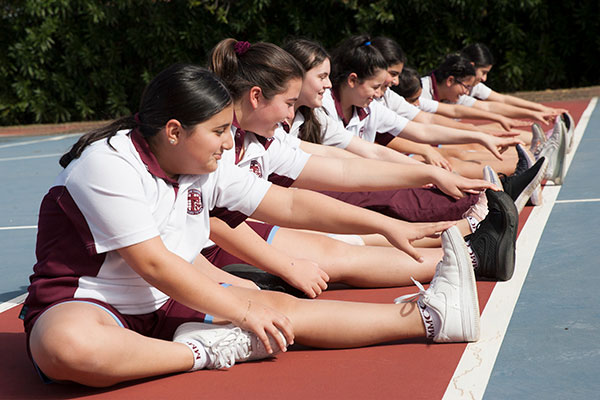 Mary MacKillop Catholic College Wakeley students stretching