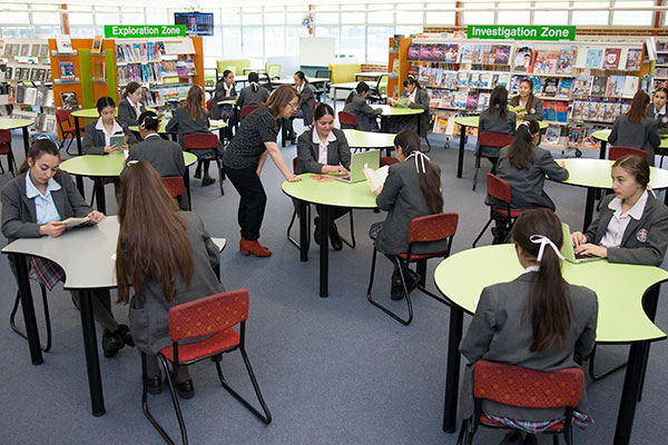 Mary MacKillop Catholic College Wakeley students reading books in school library