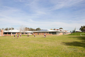 Mary MacKillop Catholic College Wakeley students enjoying green field on school grounds